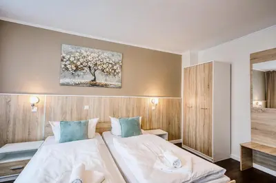 Ein Bett oder Betten in einem Zimmer der Unterkunft D&D Hotel by Wiggers