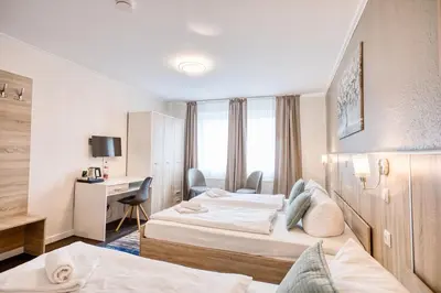 Ein Bett oder Betten in einem Zimmer der Unterkunft D&D Hotel by Wiggers