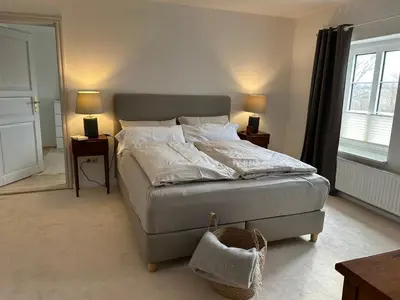 Ein Bett oder Betten in einem Zimmer der Unterkunft Ferienwohnung 2 Hof Flüh