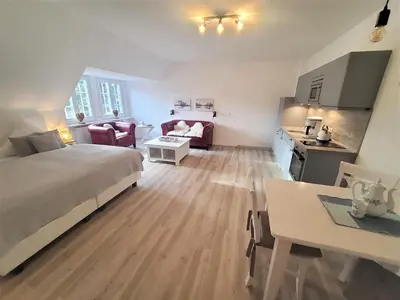 Ein Bett oder Betten in einem Zimmer der Unterkunft Landhotel garni zur Linde