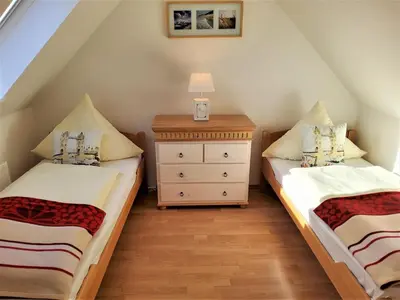 Ein Bett oder Betten in einem Zimmer der Unterkunft Landhotel garni zur Linde