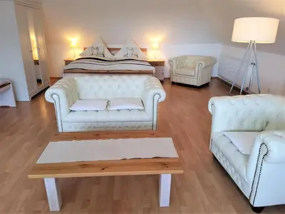Ein Bett oder Betten in einem Zimmer der Unterkunft Landhotel garni zur Linde