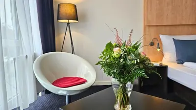 Ein Bett oder Betten in einem Zimmer der Unterkunft Good Morning + Bad Oldesloe