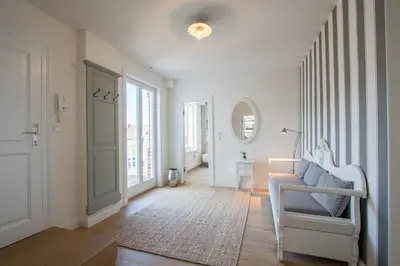 Ein Sitzbereich in der Unterkunft Strandhaus Niendorf