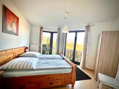 Ein Bett oder Betten in einem Zimmer der Unterkunft FeWo Rajek -Alte Salzstraße 14-