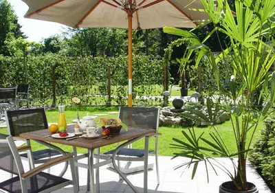 Ein Garten an der Unterkunft Hotel Waldhusen - Adults Only