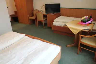 Ein Bett oder Betten in einem Zimmer der Unterkunft Hotel Ideal