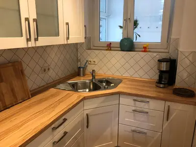 Küche/Küchenzeile in der Unterkunft WellenRausch Living 