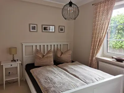 Ein Bett oder Betten in einem Zimmer der Unterkunft Entspannt Wohnen - vor den Toren Lübecks