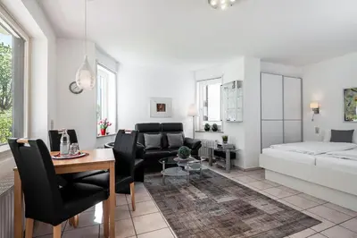 Ein Bett oder Betten in einem Zimmer der Unterkunft Strand & Park