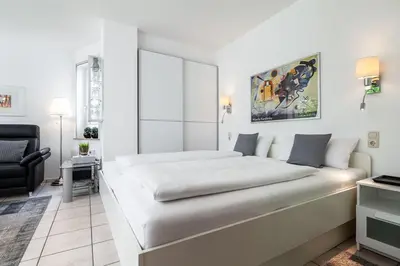 Ein Bett oder Betten in einem Zimmer der Unterkunft Strand & Park