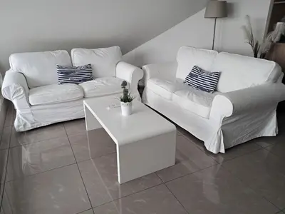 Ein Sitzbereich in der Unterkunft Gästehaus Vogelsang