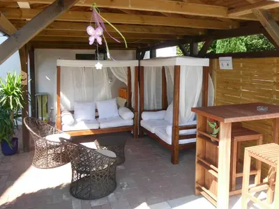 Ein Bett oder Betten in einem Zimmer der Unterkunft Villa Vogelsang