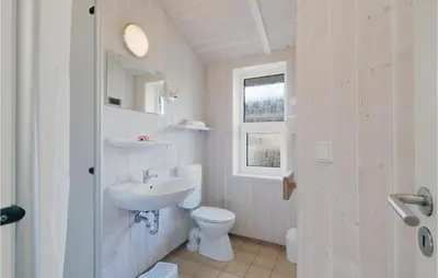 Ein Badezimmer in der Unterkunft Frische Brise 11 - Dorf 2