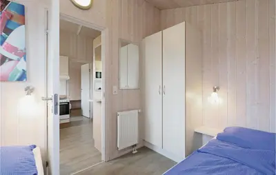 Ein Bett oder Betten in einem Zimmer der Unterkunft Abendrot 5 - Dorf 3