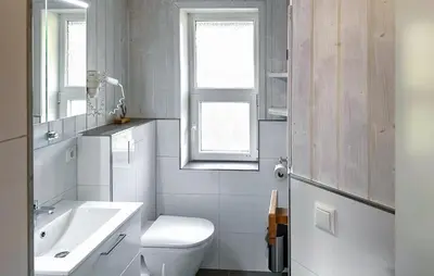 Ein Badezimmer in der Unterkunft Frische Brise 17 - Dorf 3