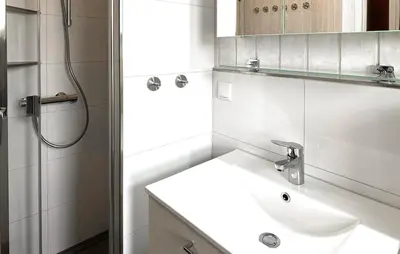 Ein Badezimmer in der Unterkunft Frische Brise 17 - Dorf 3