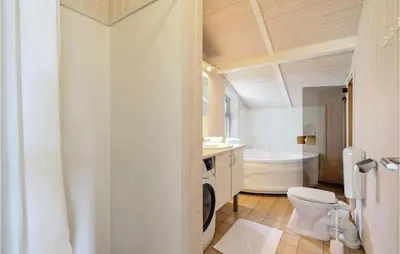 Ein Badezimmer in der Unterkunft Frische Brise 31 - Dorf 3
