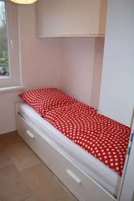 Ein Bett oder Betten in einem Zimmer der Unterkunft Ferienwohnung Seega