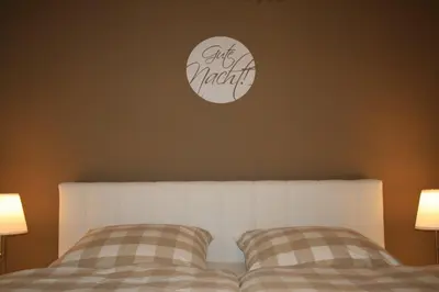 Ein Bett oder Betten in einem Zimmer der Unterkunft Ferienwohnung Seega