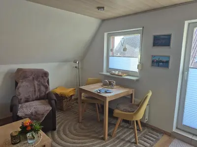 Ein Sitzbereich in der Unterkunft Ferienwohnung Röpersberg