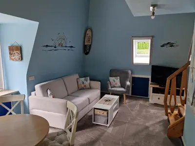 Ein Sitzbereich in der Unterkunft Appartment Holiday