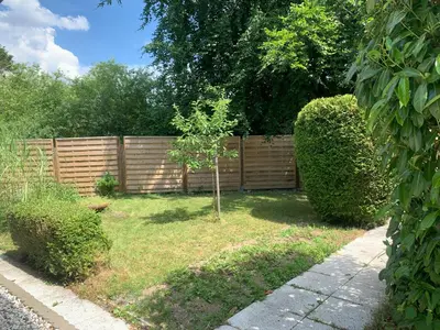 Ein Garten an der Unterkunft Strandbungalow / Ferienhaus Ostsee