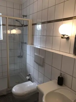 Ein Badezimmer in der Unterkunft Strandbungalow / Ferienhaus Ostsee