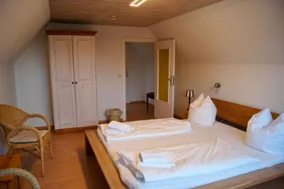 Ein Bett oder Betten in einem Zimmer der Unterkunft Nobis Krug