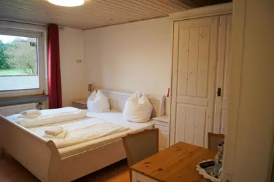 Ein Bett oder Betten in einem Zimmer der Unterkunft Nobis Krug