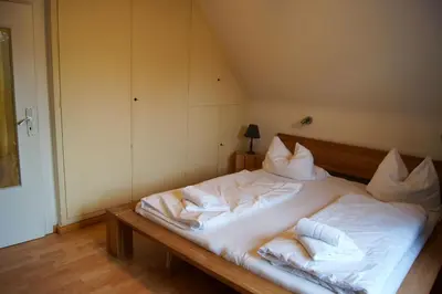 Ein Bett oder Betten in einem Zimmer der Unterkunft Nobis Krug