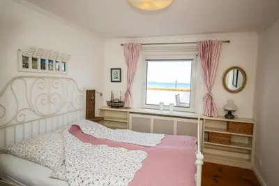 Ein Bett oder Betten in einem Zimmer der Unterkunft Ferienwohnung Barebica