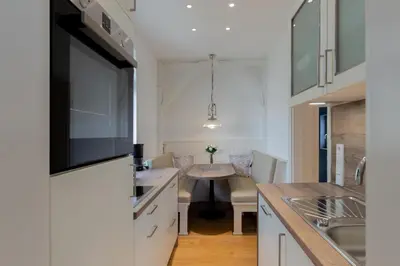 Küche/Küchenzeile in der Unterkunft Ferienwohnung Villa Susewind 1