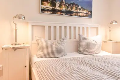 Ein Bett oder Betten in einem Zimmer der Unterkunft Ferienwohnung Onkel Toms Hütte