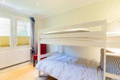 Ein Bett oder Betten in einem Zimmer der Unterkunft Ferienwohnung Onkel Toms Hütte