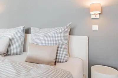 Ein Bett oder Betten in einem Zimmer der Unterkunft Ferienwohnung 30 Grad