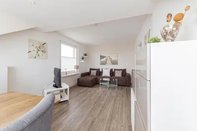 Ein Sitzbereich in der Unterkunft Ferienwohnung 2 Haus Meeresrauschen
