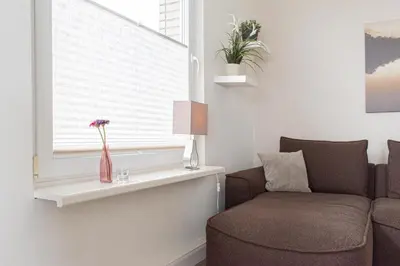 Ein Sitzbereich in der Unterkunft Ferienwohnung 2 Haus Meeresrauschen
