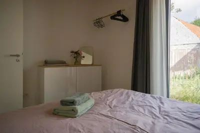 Ein Bett oder Betten in einem Zimmer der Unterkunft Ferienwohnung 