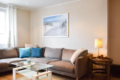 Ein Sitzbereich in der Unterkunft Ferienwohnung 1 Haus Meeresrauschen