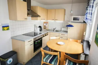 Küche/Küchenzeile in der Unterkunft Ferienhaus Fischerhus Alice