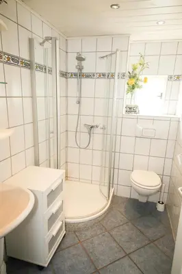 Ein Badezimmer in der Unterkunft Ferienhaus Fischerhus Alice