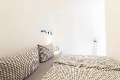 Ein Bett oder Betten in einem Zimmer der Unterkunft Ferienwohnung App. 9 Haus Duckdalben