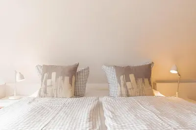 Ein Bett oder Betten in einem Zimmer der Unterkunft Ferienwohnung Glücksmomente