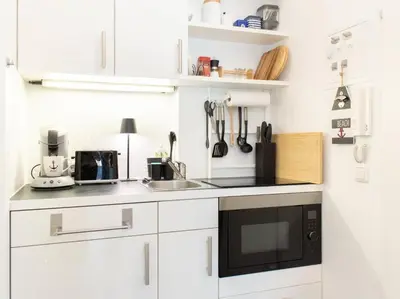 Küche/Küchenzeile in der Unterkunft Ferienwohnung Beach