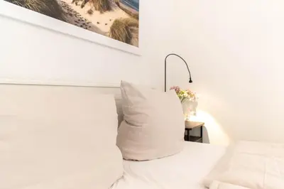 Ein Bett oder Betten in einem Zimmer der Unterkunft Ferienwohnung App. 1 Haus Duckdalben
