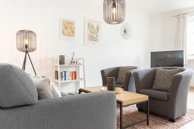 Ein Sitzbereich in der Unterkunft Ferienwohnung App. 1 Haus Duckdalben