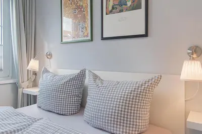 Ein Bett oder Betten in einem Zimmer der Unterkunft Ferienwohnung Dünenmeer