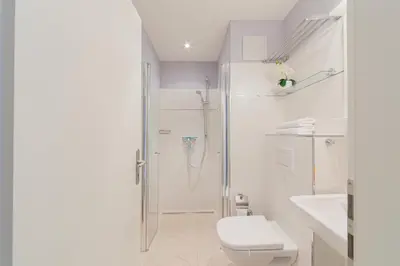 Ein Badezimmer in der Unterkunft Ferienwohnung Dünenmeer