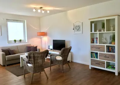 TV/Unterhaltungsangebot in der Unterkunft Ferienwohnung Dünenhäuser App. A2